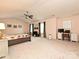 Large main bedroom featuring plush carpet, a ceiling fan, and a dedicated desk area at 1033 Lilly Pond Dr, Fort Mill, SC 29715