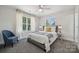 Cozy bedroom with natural light, plush carpet, and stylish decor creates a relaxing and inviting atmosphere at 1112 Allman Ext, Mount Pleasant, NC 28124