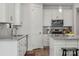 Well-designed kitchen with granite countertops, white cabinets, and modern stainless steel appliances at 1112 Allman Ext, Mount Pleasant, NC 28124