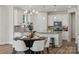Bright kitchen area with white cabinetry, granite countertops and stainless steel appliances at 1112 Allman Ext, Mount Pleasant, NC 28124