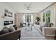 Spacious living room with fireplace, large window, and stylish modern decor at 1112 Allman Ext, Mount Pleasant, NC 28124