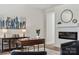 Office area boasts wood floors, a modern fireplace, and stylish decor at 1112 Allman Ext, Mount Pleasant, NC 28124