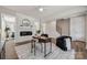 Office area features modern fireplace and a stylish desk with accent chair at 1112 Allman Ext, Mount Pleasant, NC 28124