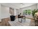 Bright office with large window, stylish desk, and comfortable chairs at 1112 Allman Ext, Mount Pleasant, NC 28124