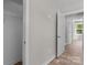 Walk-in closet with wire shelving, modern paint, and wood-look flooring at 112 Cleveland Ave, Albemarle, NC 28001