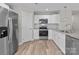 Kitchen featuring stainless steel appliances, granite countertops, and white subway tile backsplash at 112 Cleveland Ave, Albemarle, NC 28001