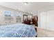 A serene bedroom featuring a large bed, dresser, and bright windows at 1161 Constitution Park Blvd, Rock Hill, SC 29732