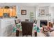 Elegant dining area next to the fireplace and open to the kitchen at 1161 Constitution Park Blvd, Rock Hill, SC 29732