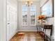 Bright entryway featuring hardwood floors, decorative table, and natural light at 1161 Constitution Park Blvd, Rock Hill, SC 29732