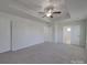 This bedroom features plush carpeting, recessed ceilings, and a ceiling fan at 1210 Longwall Ln, Matthews, NC 28104