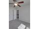 This bedroom offers plush carpeting and a ceiling fan at 1210 Longwall Ln, Matthews, NC 28104