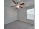 This bedroom features plush carpeting, natural light and neutral walls at 1210 Longwall Ln, Matthews, NC 28104