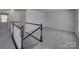 Bright staircase with white railings leading to a spacious upper level at 1210 Longwall Ln, Matthews, NC 28104