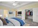 Staged primary bedroom featuring ensuite bathroom, spacious closets and a large window at 123 Shoreview Dr, Mooresville, NC 28117