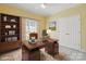 Home office features a wooden desk, bookshelf and decor at 123 Shoreview Dr, Mooresville, NC 28117