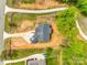 Aerial view of a home and the surrounding neighborhood featuring long driveways and mature trees at 1336 W Rebound Rd, Indian Land, SC 29720