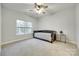 Cozy bedroom featuring a daybed, ceiling fan, neutral carpet and natural light at 1336 W Rebound Rd, Indian Land, SC 29720