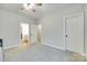 Neutral bedroom featuring a carpet, ceiling fan, and ensuite bathroom at 1336 W Rebound Rd, Indian Land, SC 29720