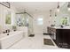 A primary bathroom with a soaking tub, a separate shower, and a double vanity at 1358 Cedardale Ln, Denver, NC 28037