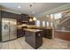 Modern kitchen with stainless steel appliances, granite countertops, and a central island at 13936 Mallard Lake Rd, Charlotte, NC 28262