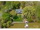 Stunning lakefront home with private dock and lush, mature landscaping at 1430 Mollys Backbone Rd, Catawba, NC 28609