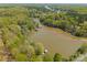 Stunning aerial view of a lakefront community surrounded by lush green trees and docks at 1430 Mollys Backbone Rd, Catawba, NC 28609