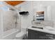 Bright renovated bathroom featuring a tile shower and modern fixtures at 1430 Mollys Backbone Rd, Catawba, NC 28609