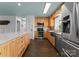 Spacious kitchen with stainless steel appliances, stone backsplash, and ample counter space at 1430 Mollys Backbone Rd, Catawba, NC 28609