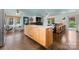 Open-concept living space with large island, stylish seating, and cozy fireplace at 1430 Mollys Backbone Rd, Catawba, NC 28609