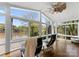 Bright sunroom with lake views and large windows to enjoy a view of the outdoors at 1430 Mollys Backbone Rd, Catawba, NC 28609