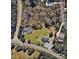 Aerial of homes in a wooded neighborhood with spacious lawns at 14532 E Rocky River Rd, Davidson, NC 28036