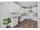 Well-lit kitchen featuring modern cabinetry, granite countertops, and stainless steel appliances at 14532 E Rocky River Rd, Davidson, NC 28036