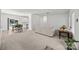 Bright living room with hardwood floors, carpet, and open floor plan at 14532 E Rocky River Rd, Davidson, NC 28036