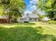 Beautiful backyard featuring a well-maintained lawn and a cozy patio area for entertaining at 1506 Crestdale Rd, Rock Hill, SC 29732