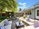 Outdoor patio area featuring ample seating, a dining table, and a decorative fence at 1506 Crestdale Rd, Rock Hill, SC 29732