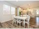 Inviting dining area bathed in natural light, adjacent to a stylish kitchen at 1516 Laggan Ln, Indian Trail, NC 28079