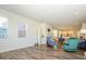 Spacious living area featuring open floor plan, fireplace, and wood-look floors provides a modern feel at 1516 Laggan Ln, Indian Trail, NC 28079