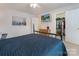 Primary bedroom features a closet, tv, chest of drawers, and a bed at 16219 Long Talon Way, Charlotte, NC 28273