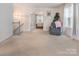Bonus room features sitting area, light colored walls and carpeted floors at 16219 Long Talon Way, Charlotte, NC 28273