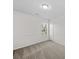 A bright bedroom has neutral walls and carpet with a window that looks onto the property at 1762 Tate Rd, Rock Hill, SC 29732