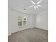 Bedroom with neutral carpet, ceiling fan, and a window with natural light at 1762 Tate Rd, Rock Hill, SC 29732