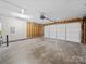 Spacious two-car garage with unfinished walls and concrete floors at 1762 Tate Rd, Rock Hill, SC 29732