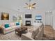 Bright living room with a fireplace, hardwood floors, and large windows at 1762 Tate Rd, Rock Hill, SC 29732