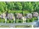 An aerial view showcases the home's prime location within a lush, green neighborhood and well-maintained lawns at 2001 Arundale Ln, Matthews, NC 28104