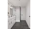 Modern bathroom features a double sink vanity and a large walk-in shower at 2011 Sadler Woods Ln, Charlotte, NC 28214