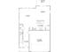 First floor plan showing kitchen, living room, and garage at 2011 Sadler Woods Ln, Charlotte, NC 28214