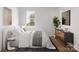 Bright and minimalist bedroom with hardwood floors, a large window, and a comfortable bed at 2015 Sadler Woods Ln, Charlotte, NC 28214