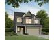 Charming two-story home with gray siding, white trim and shutters, plus a two-car garage at 2015 Sadler Woods Ln, Charlotte, NC 28214
