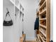 Organized closet with built-in shelves and storage solutions for shoes and accessories at 2165 Country Club Rd, Lincolnton, NC 28092