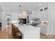 Bright, white kitchen featuring a large island with seating and modern appliances at 2165 Country Club Rd, Lincolnton, NC 28092